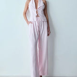 CALCA RETA COM ELASTICO NA CINTURA E BOLSO COSTAS ROSA BEBE