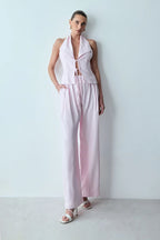 CALCA RETA COM ELASTICO NA CINTURA E BOLSO COSTAS ROSA BEBE