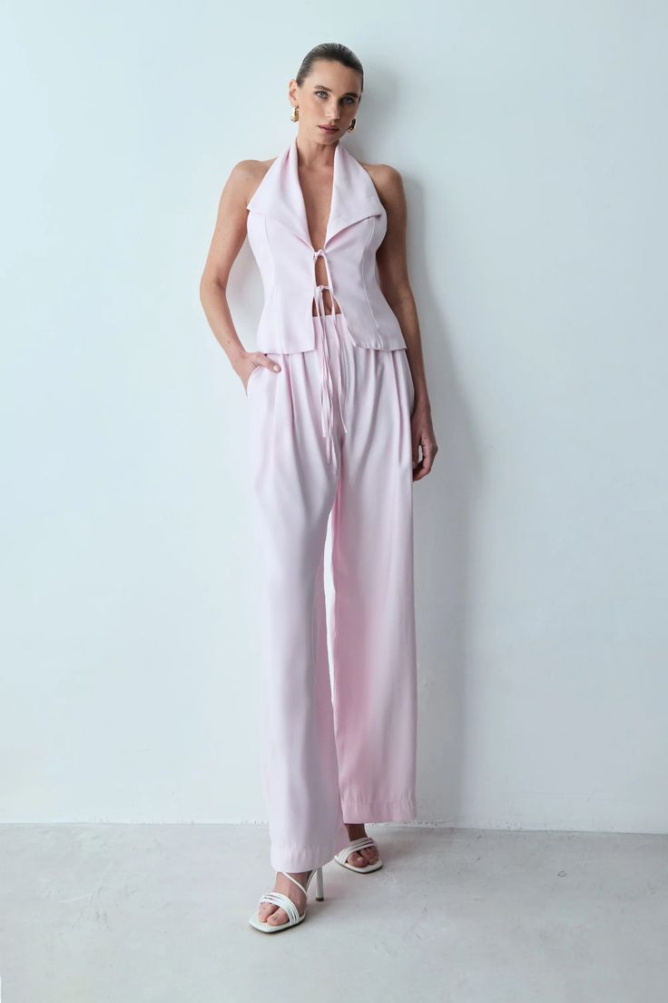 CALCA RETA COM ELASTICO NA CINTURA E BOLSO COSTAS ROSA BEBE